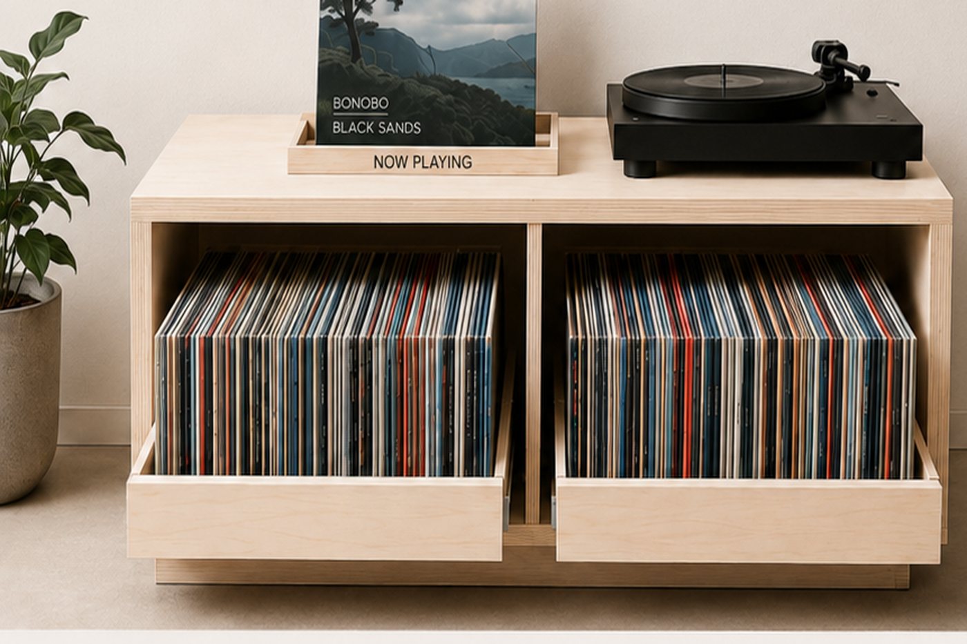 Design visualisation of the Kanso Record 01 pull-out vinyl storage unit in birch plywood, with two full-extension drawers of records and an integrated now playing slot.